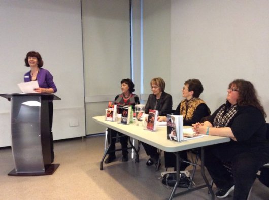 At podium: Deb Quaile L-R: Donna Warner, Gloria Ferris, Joanne Guidoccio, Alison Bruce